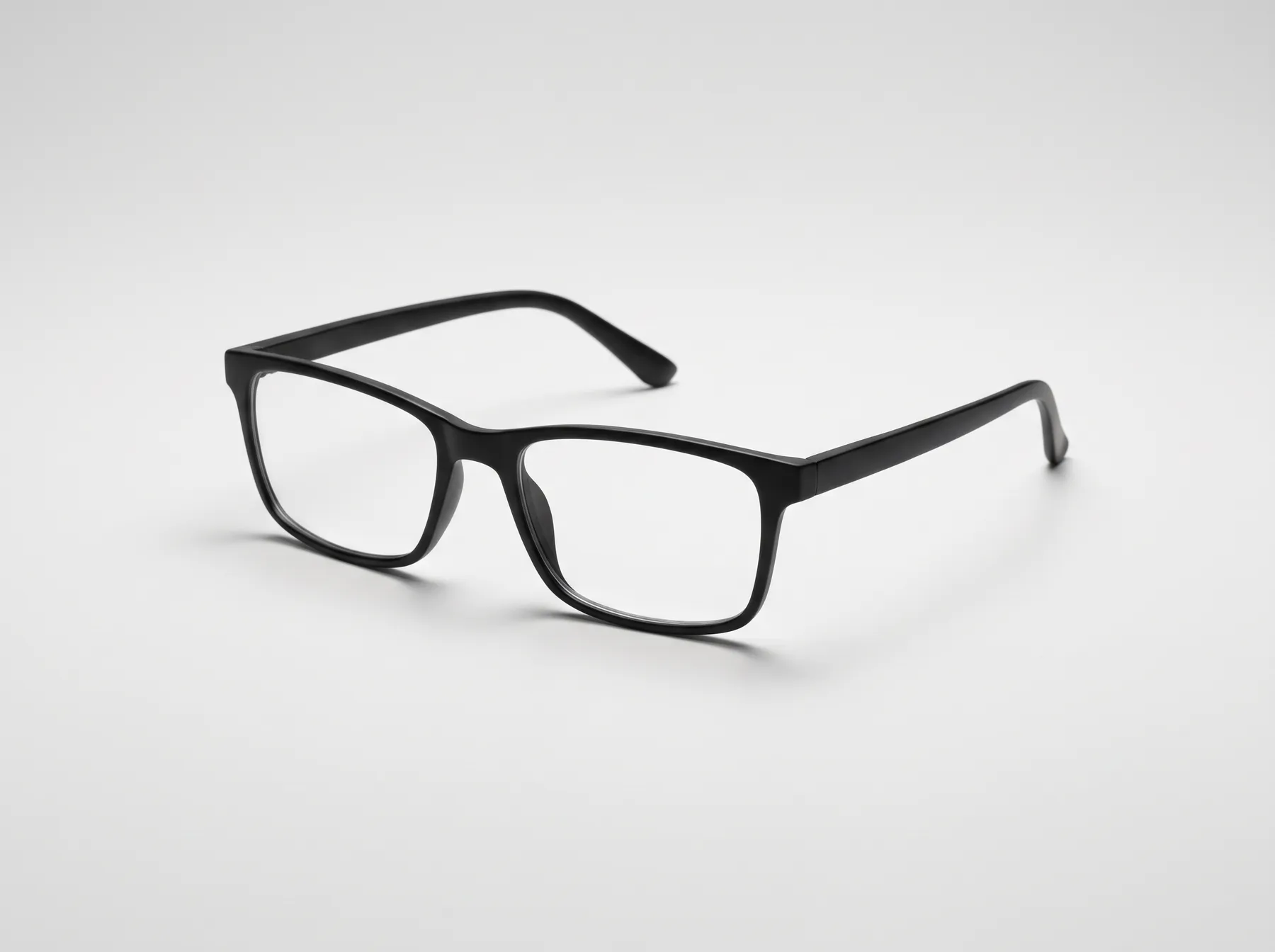 A pair of black prescription glasses